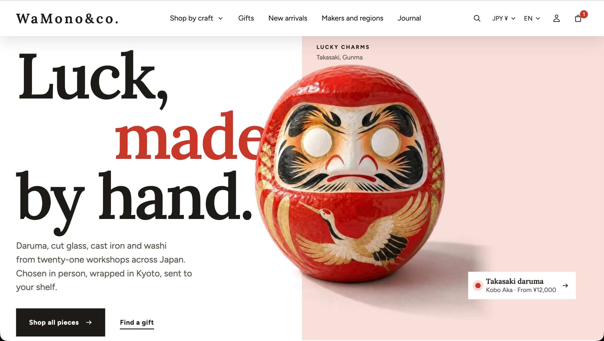 The Kyoto demo store home page: the headline “Luck, made by hand.” next to a red Takasaki daruma on a pale pink field